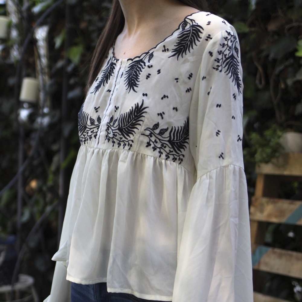 Boho chic black and white bell sleeve blouse